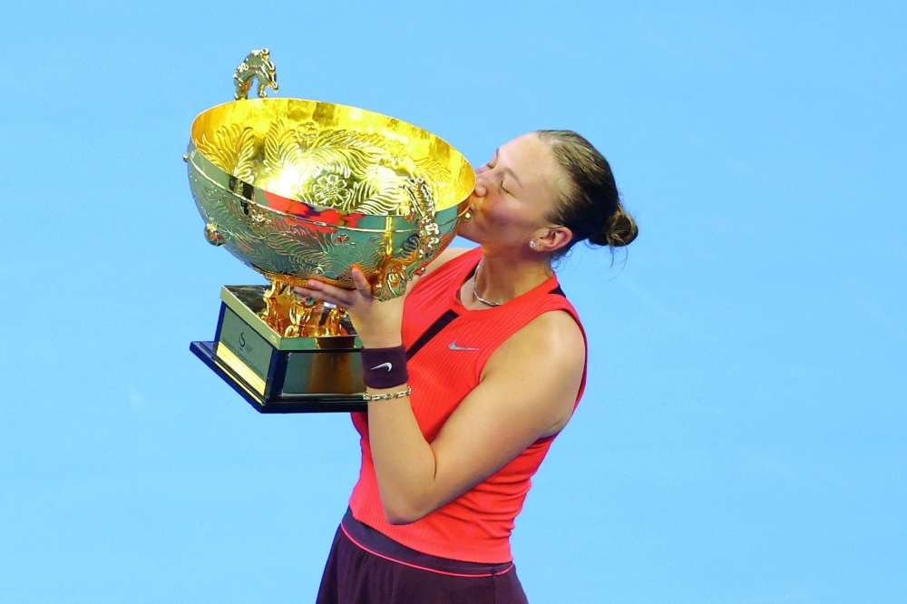 Amanda Anisimova of the US celebrates with the trophy after winning her singles final match against Czech Republic's Linda Noskova. — Reuters