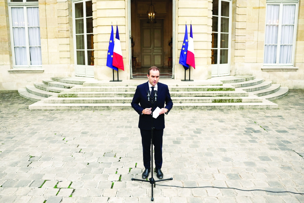 French outgoing PM Sebastien Lecornu delivers a statement at the Hotel Matignon in Paris. — Reuters