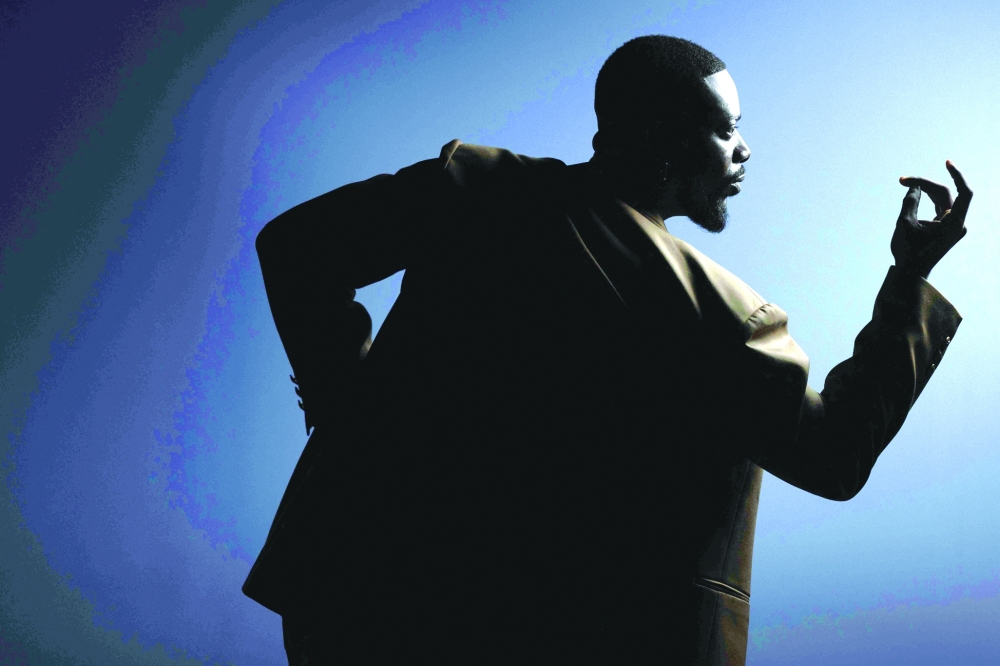 Nigerian Afrobeat singer and songwriter Adekunle Almoruf Kosoko, known professionally as Adekunle Gold and AG Baby, poses during a photo session in Paris on September 9, 2025. A worldwide star of Afropop, Nigerian singer Adekunle Gold returns to his roots in his sixth album, "Fuji", available on October 3, 2025 - a tribute to the ancestral sounds of his country. (Photo by JOEL SAGET / AFP)
