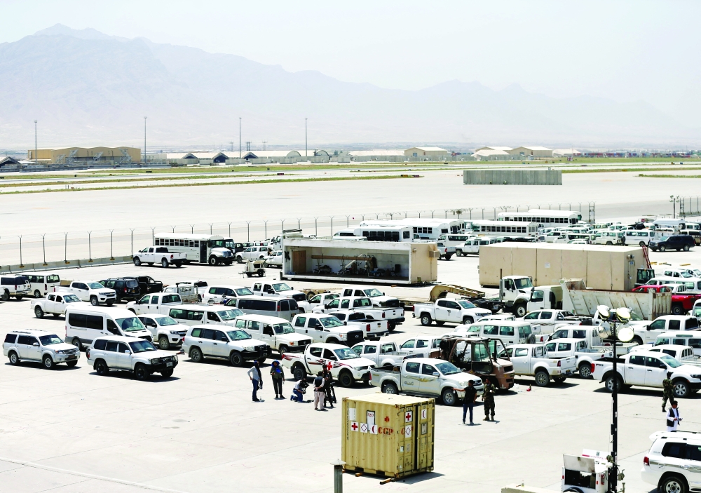 Parked vehicles are seen in Bagram US air base, after American troops vacated it, in Parwan province. — Reuters file photo