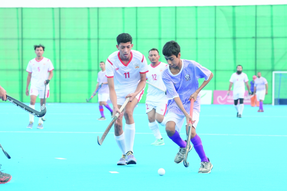 Oman and Muscat players in action