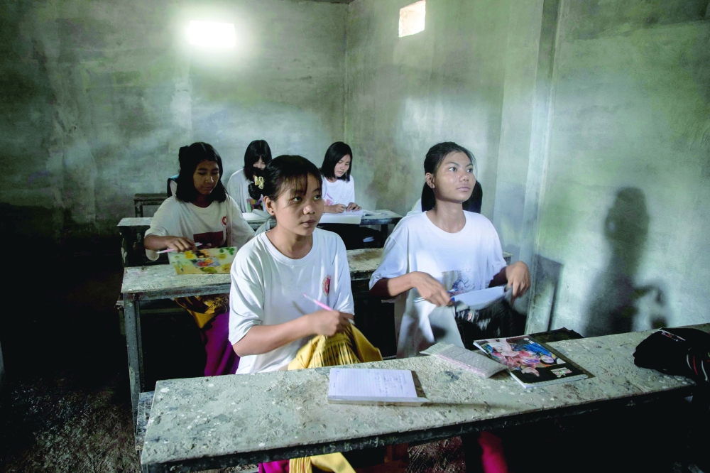 Beneath the bombs, class goes on in Myanmar