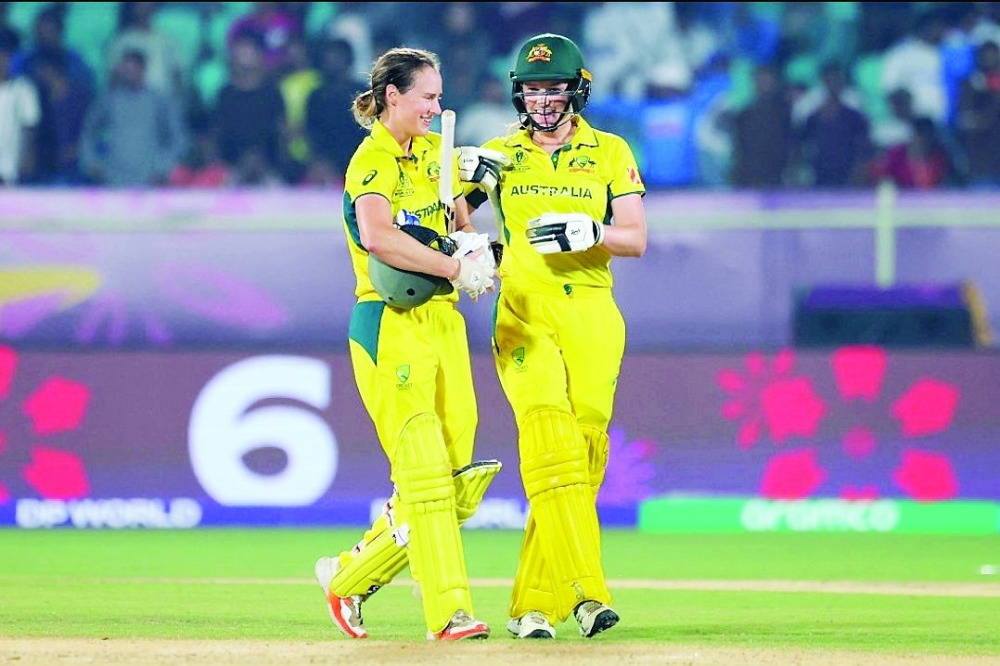 Healy century powers Australia to record chase against India