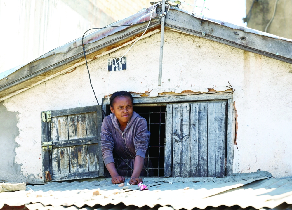 A child watches march during a nationwide youth-led protest, in Antananarivo, Madagascar. — Reuters