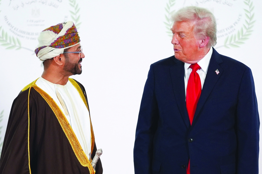 Sayyid Badr bin Hamad al Busaidy, Foreign Minister, with US President Donald Trump during a summit on Gaza in Sharm El Sheikh on Monday. — AFP