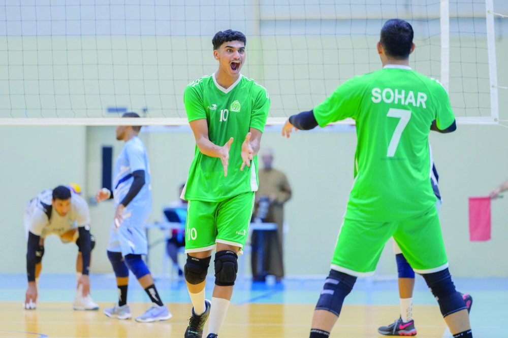 Sohar players celebrate a point against Saham.
