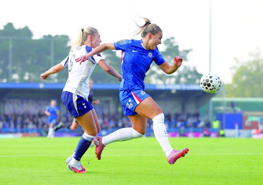 Chelsea's Johanna Rytting Kaneryd in action with Tottenham Hotspur's Amanda Nilden. — Reuters