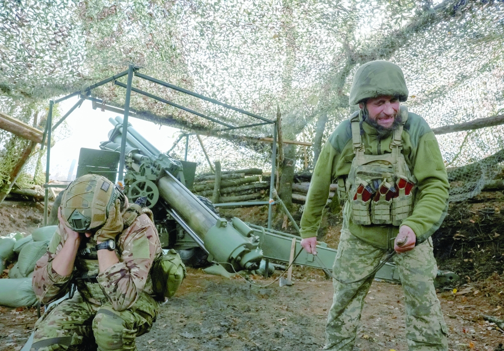 Ukraine artillerymen fire an M114 self-propelled howitzer towards Russian troops near the Pokrovsk in Donetsk region on Wednesday. — Reuters