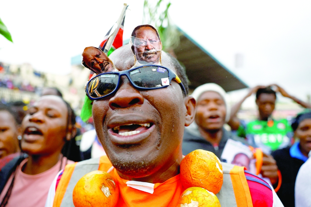 Mourners react during a requiem for former Kenyan Prime Minister Raila Odinga inside the Nyayo National Stadium in Nairobi. — Reuters
