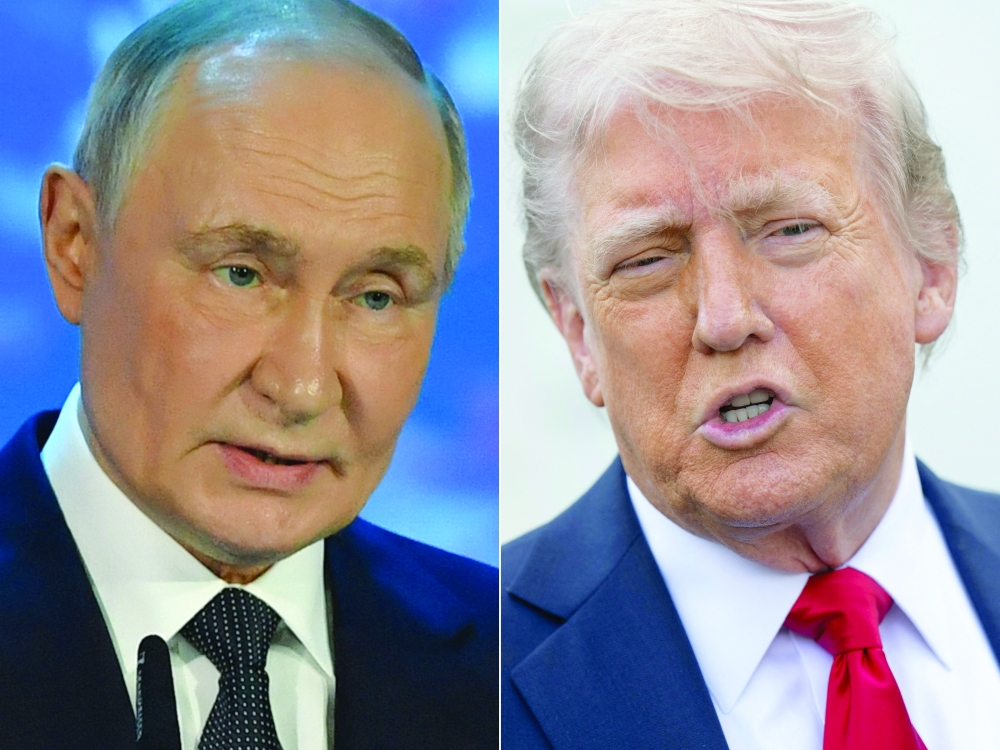 Russian President Vladimir Putin and US President Donald Trump. — AFP File