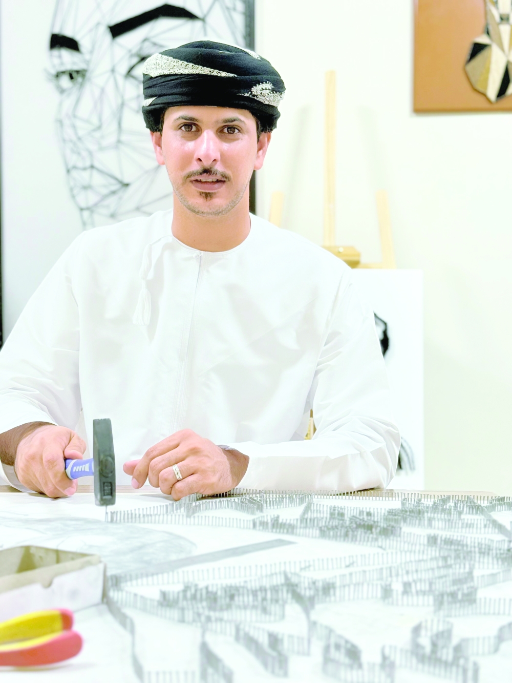 Mazen Said Ali al Quraini at work