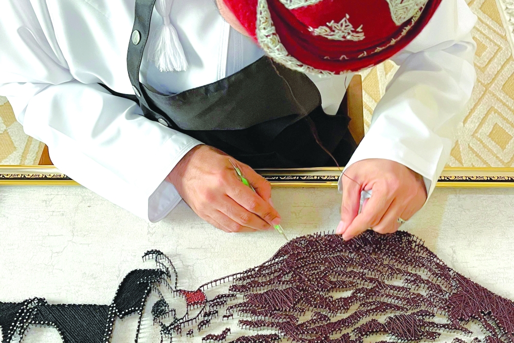 Mazen Said Ali al Quraini at work