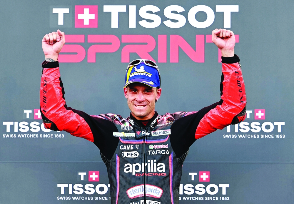 Marco Bezzecchi celebrates after winning the Australian GP race.