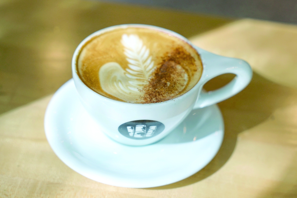 A cup of coffee is served at a coffee shop in New York City. - AFP