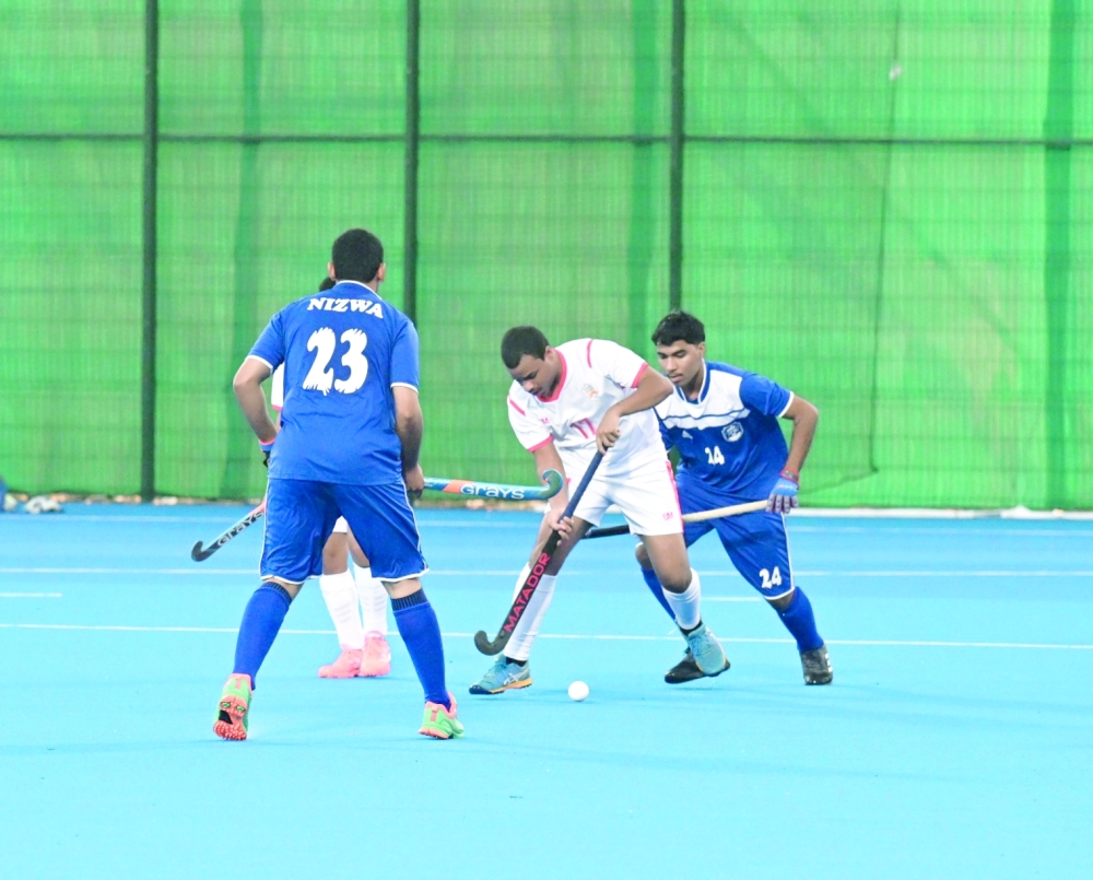 Nizwa and Oman Club players in action.