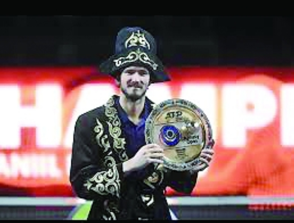 Medvedev celebrates with the trophy ATP 250 tournament in Almaty.