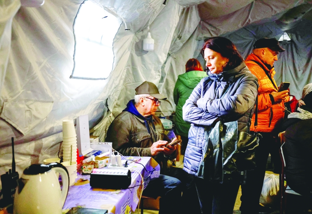 People shelter inside an invincibility centre, in Chernihiv, Ukraine. — Reuters