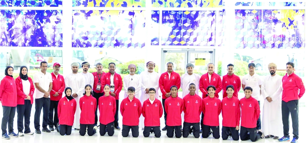 Group photo of teams and the mission director upon arrival at Bahrain Airport. — Nawaf al Busaidy