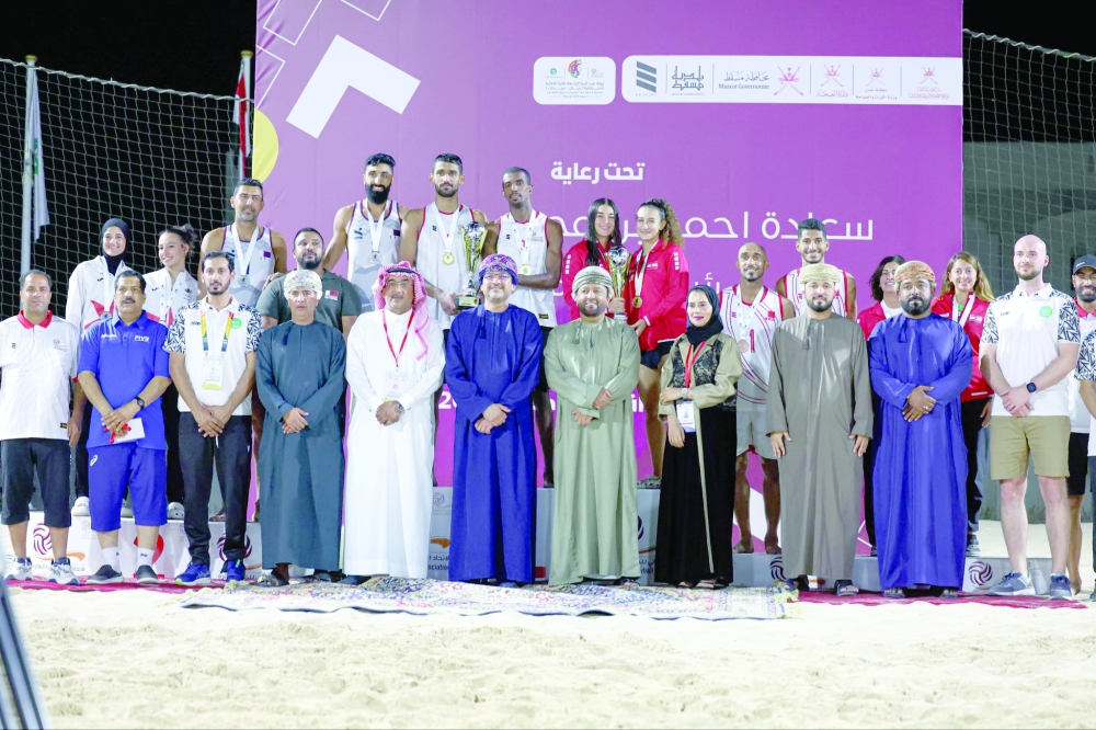 The top three winners of men's and women's sections with the officials. 