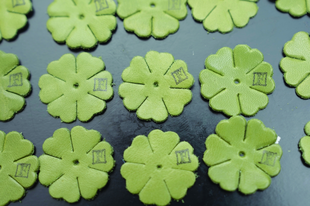 Custom boutonnieres in progress at Andrew Werner’s apartment in New York. Werner runs Fleur’d Pins out of his apartment in Manhattan’s Tudor City. — NYT