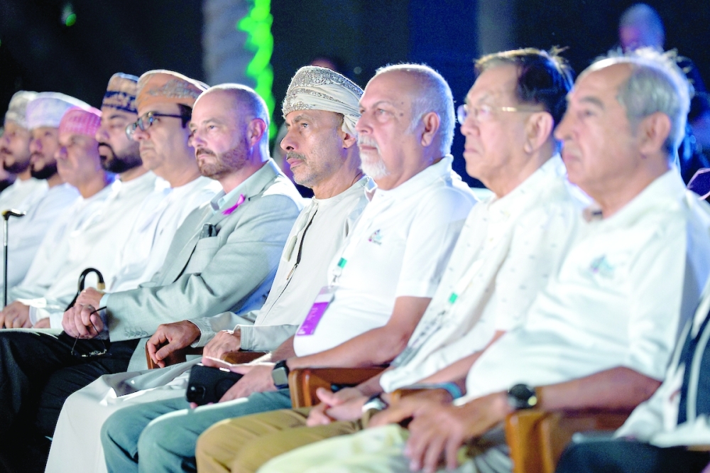 Guests and officials attend the opening ceremony.