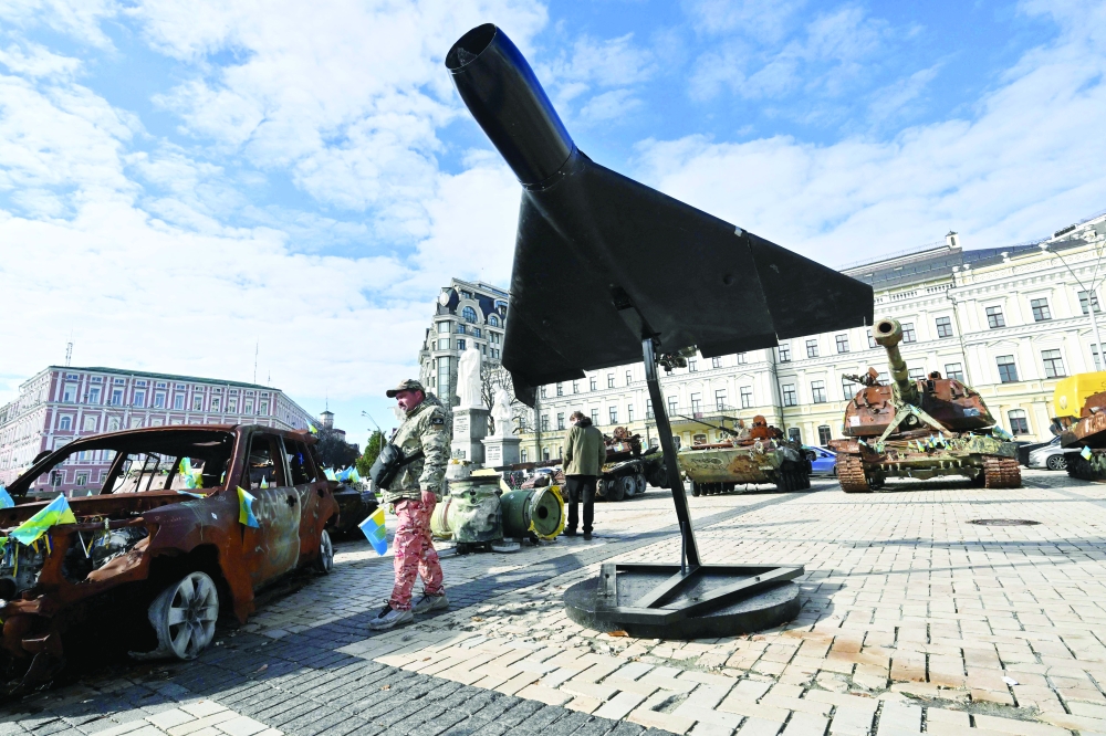 A man walks past Russia Iranian drone Shahed 136 (Geranium-2), a new exhibit of open-air exhibition destroyed Russian equipment in Kyiv on Monday, amid Russian attack on Ukraine. — AFP