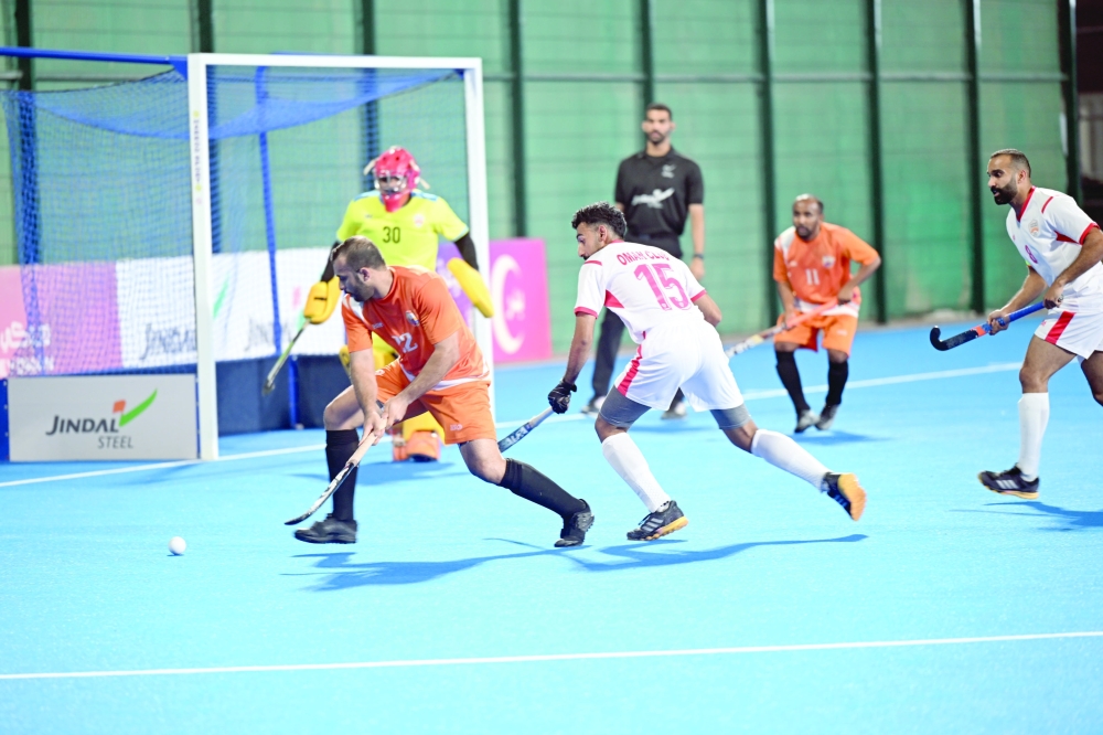 Qurayat make an attack at the Oman Club goalmouth. — Khalfan al Ruzaiqi