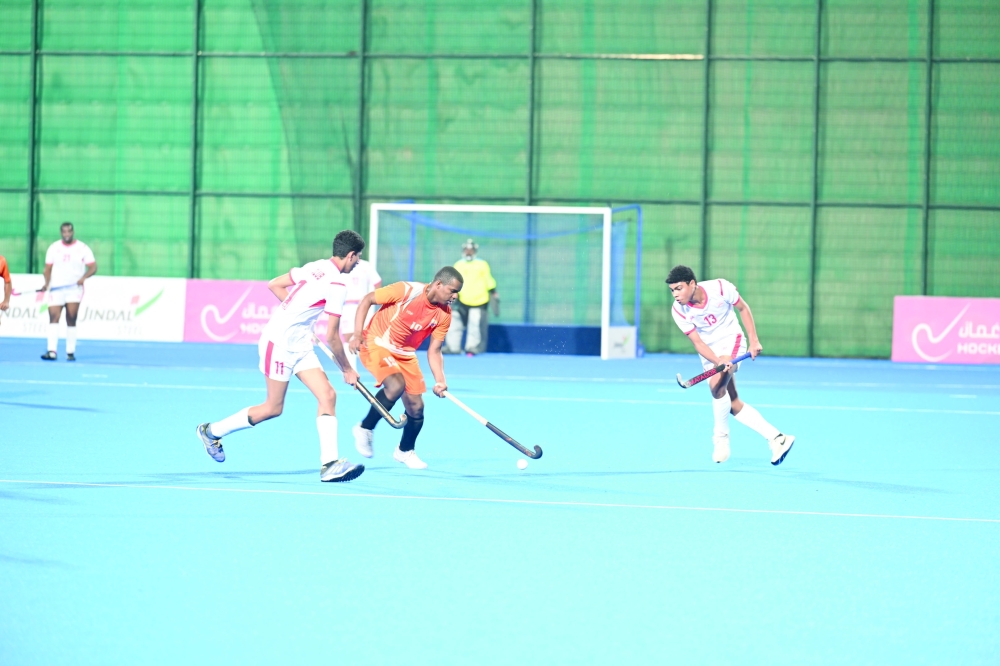 Qurayat and Oman Club players in action at Hockey Oman Stadium. — Khalfan al Ruzaiqi