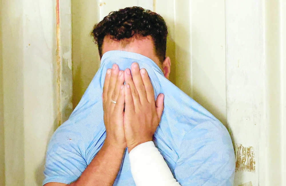 A mourner reacts, on the day of the funeral for members of the Abu Dalal family, who were killed in an overnight Israeli strike on their home, in Nuseirat, central Gaza Strip, on Wednesday. - Reuters