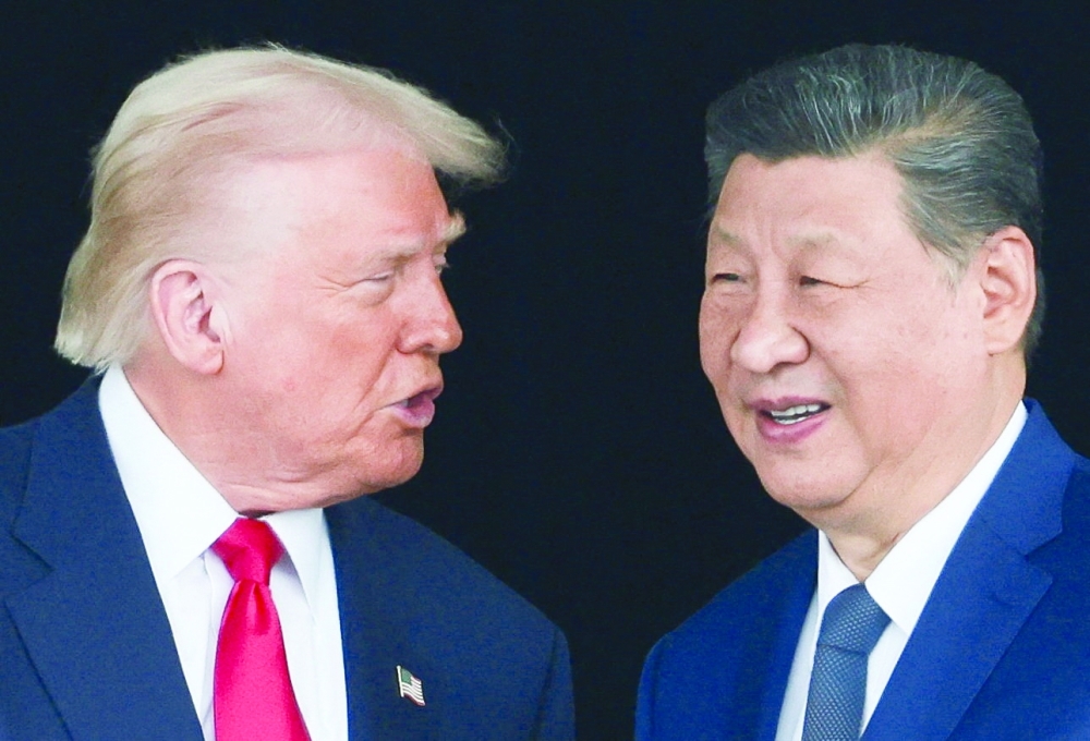 US President Donald Trump meets with Chinese President Xi Jinping on the sidelines of the APEC summit in Busan. - Reuters