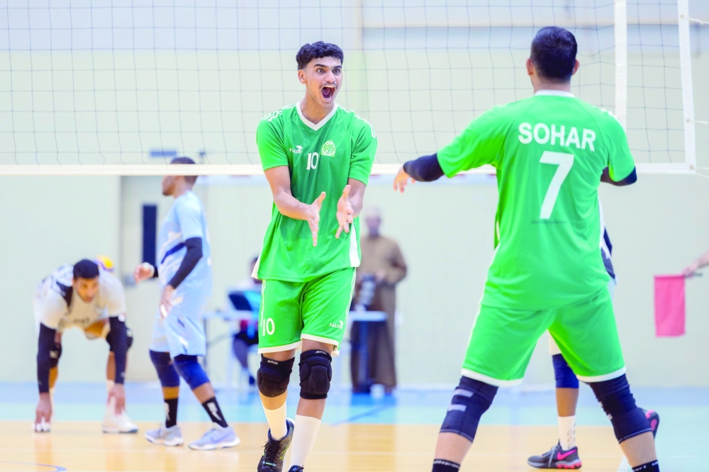 Sohar players celebrate after scoring a point.
