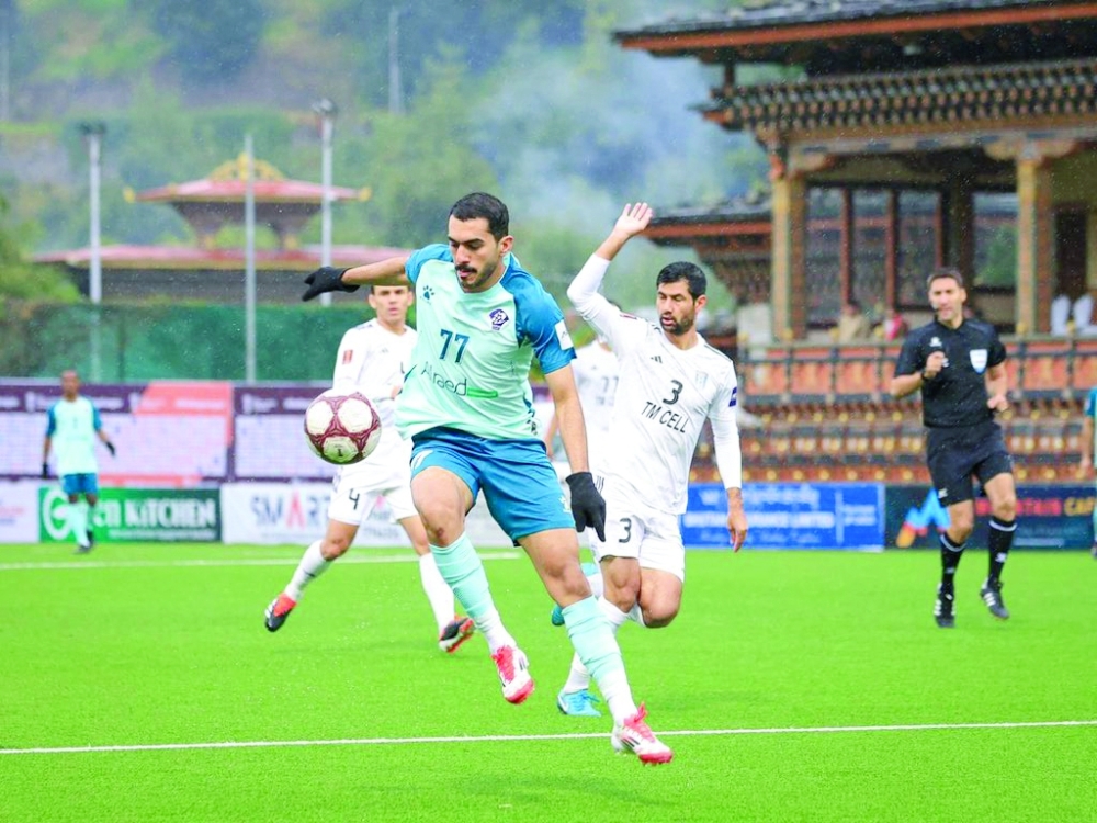 Al Shabab and Altyn Asyr FC players in action.