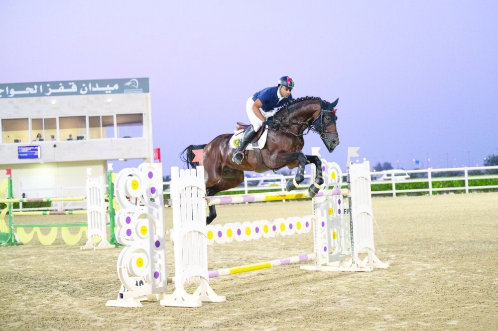 A rider in action during the second round of the Show Jumping season at the Al Rahba Racecourse in Barka. — Rashid al Tooqi