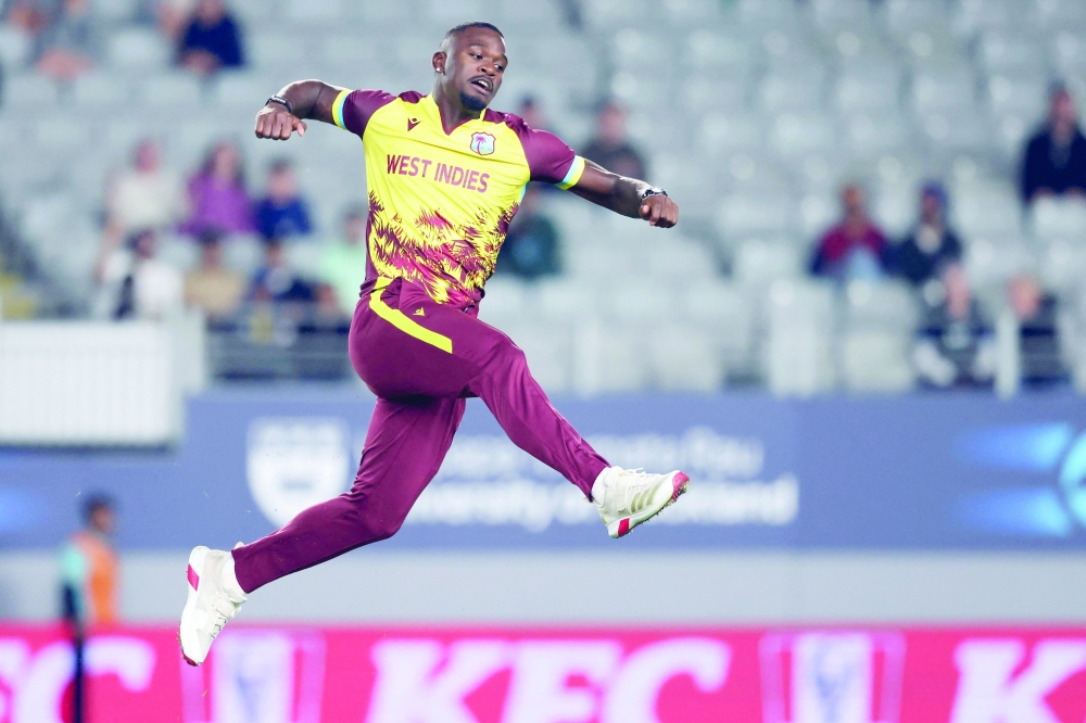 West Indies' Jayden Seales celebrates the wicket of New Zealand's Michael Bracewell during the first Twenty20 international cricket match between New Zealand and West Indies played at Eden Park in Auckland on November 5, 2025. (Photo by Michael Bradley / AFP)
