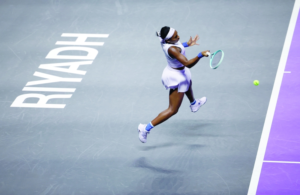Coco Gauff of the US in action during her group stage match against Italy's Jasmine Paolini. — Reuters