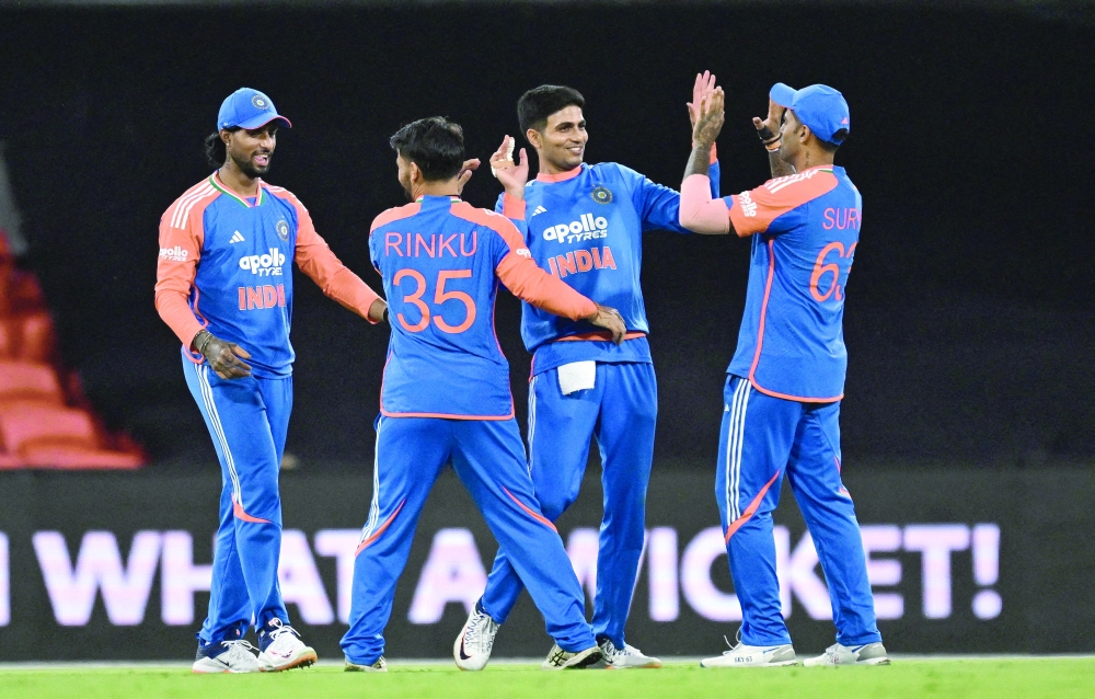 Cricket - Fourth Twenty20 International - Australia v India - Metricon Stadium, Carrara, Australia - November 6, 2025 India players celebrate winning the match. — Reuters