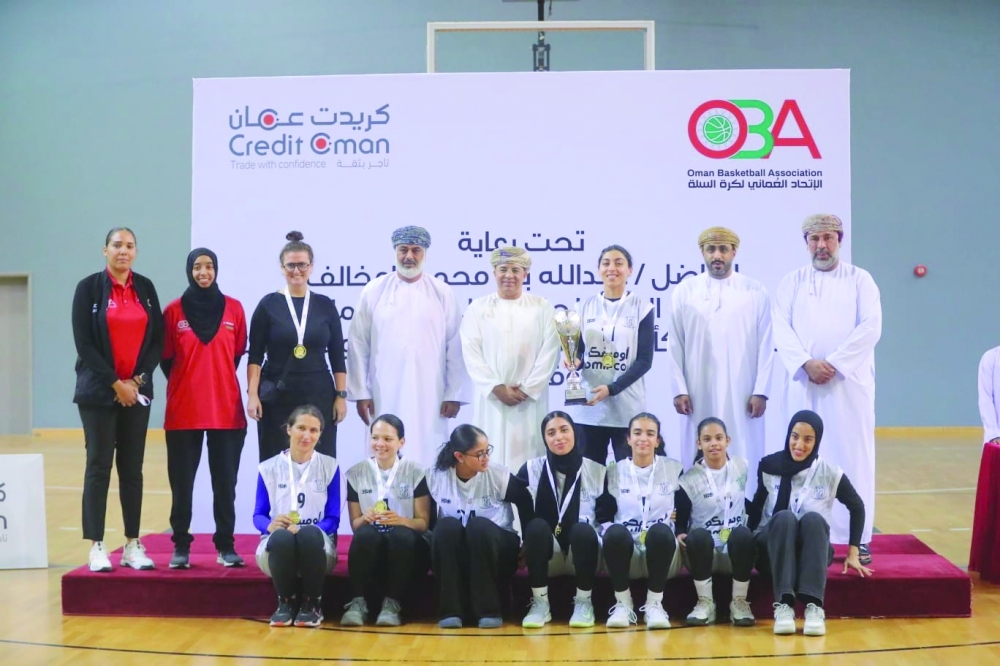 Masirah players pose with the trophy. — Ammar al Musafir