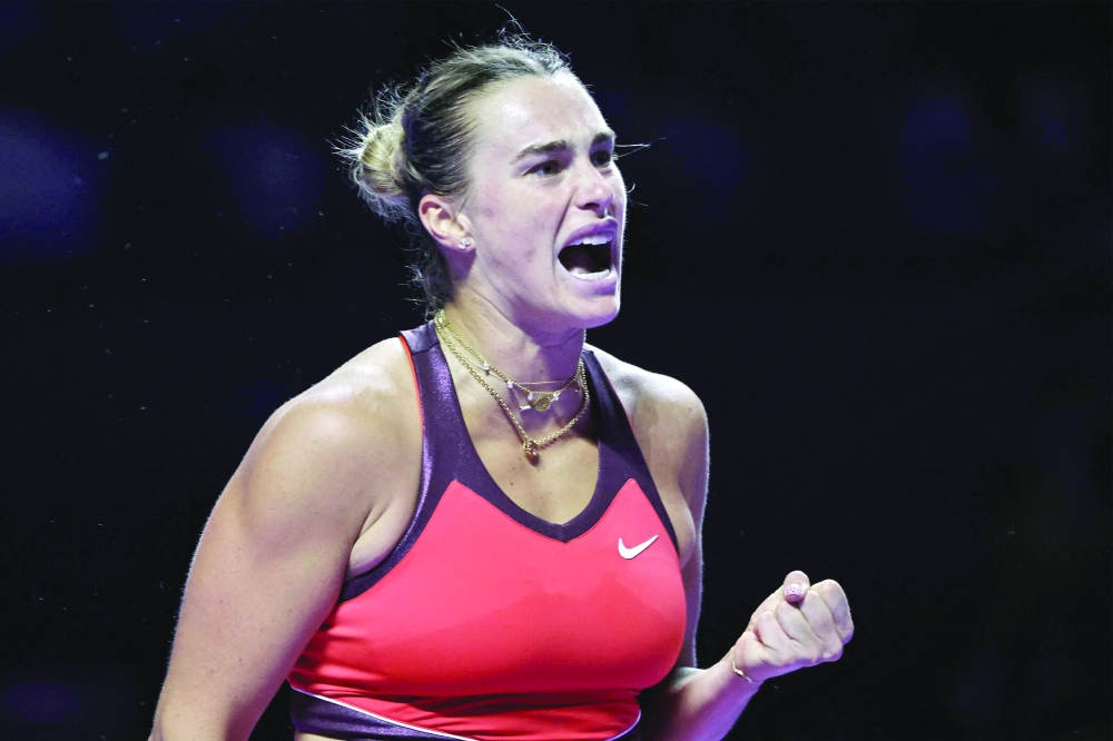 Belarus' Aryna Sabalenka reacts after a point against US' Coco Gauff during their WTA Finals tennis tournament in Riyadh on November 6, 2025. (Photo by Fayez NURELDINE / AFP)
