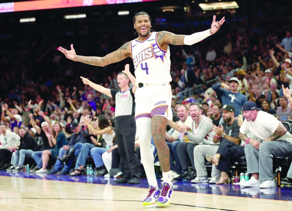 Phoenix Suns guard Jalen Green (4) celebrates a three point shot against the Los Angeles Clippers. — Imagn Images