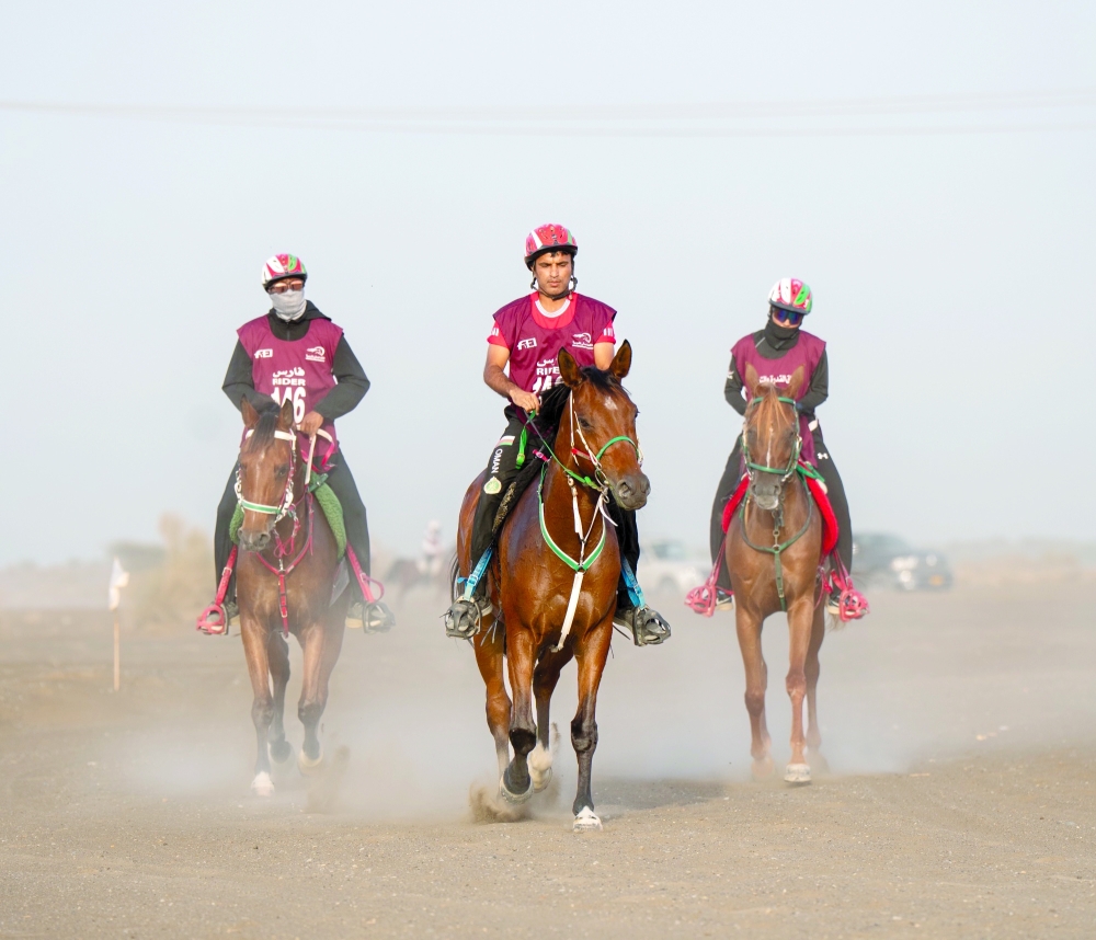 The Royal Cavalry riders in action during the race at Al Mahamid Village. — Pics by Asaad al Badri/Rashid al Toqi