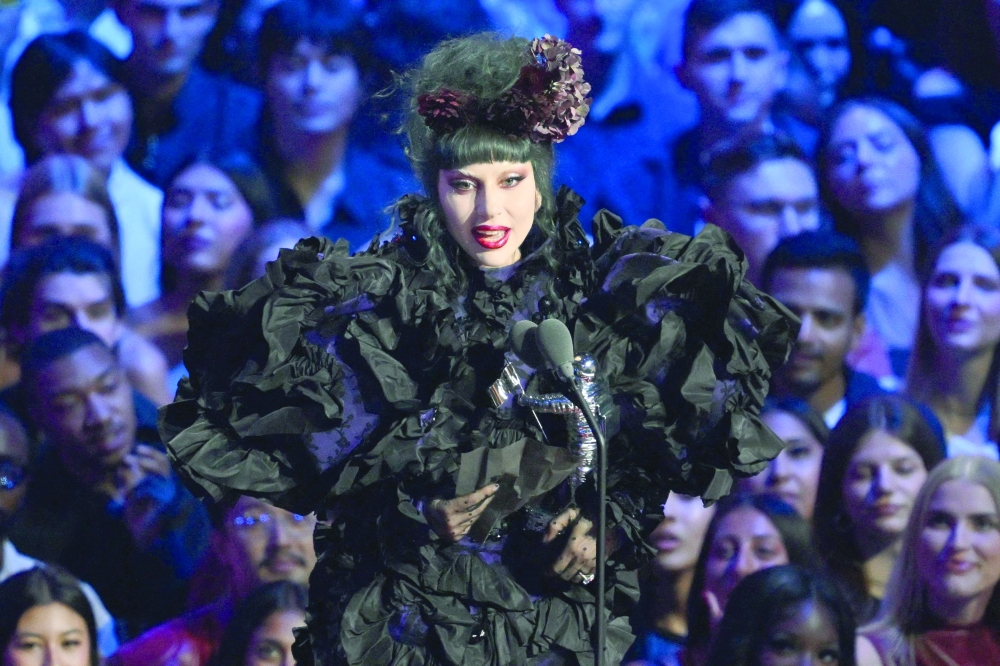 US singer-songwriter Lady Gaga accepts the Artist of the Year award on stage during the MTV Video Music Awards at UBS Arena in Elmont, New York. — AFP File