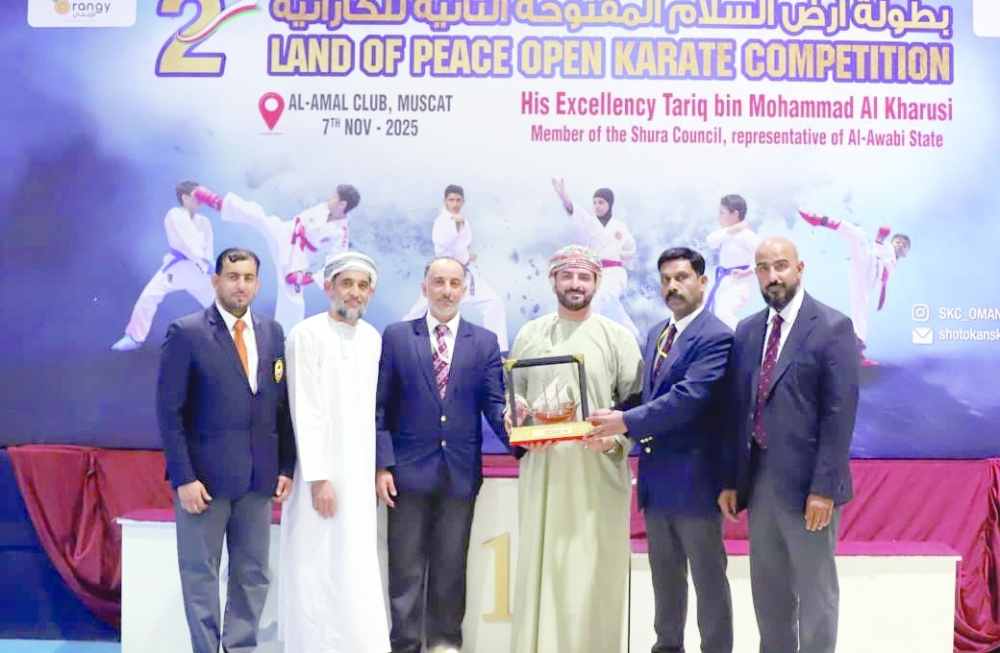 The chief guest being presented a memento.