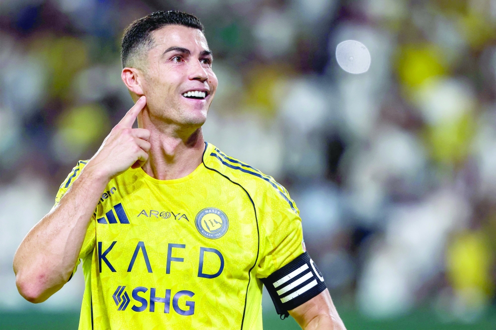 Al Nassr's Portuguese forward #07 Cristiano Ronaldo celebrates after scoring a goal during the Saudi Pro League football match between Al Nassr and Al Riyadh SC at Al Awwal Park in Riyadh on September 20, 2025. — AFP
