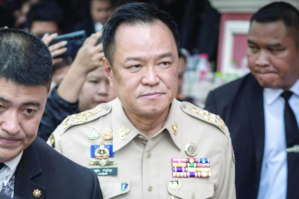 Thailand's PM Anutin Charnvirakul (C) walks after chairing a National Security Council (NSC) meeting, in Bangkok. — AFP