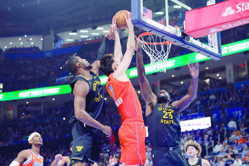 Oklahoma City Thunder centre Chet Holmgren (7) goes to the basket as Golden State Warriors forward Draymond Green (23) defends. — AFP