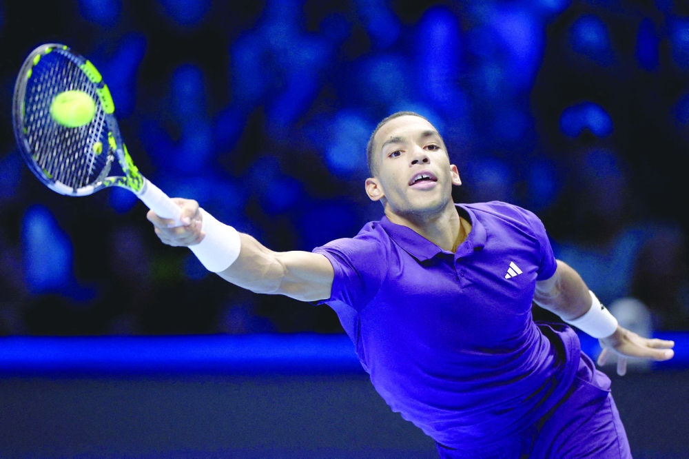 Canada's Felix Auger Aliassime in action during his group stage match against Ben Shelton of the US. — Reuters