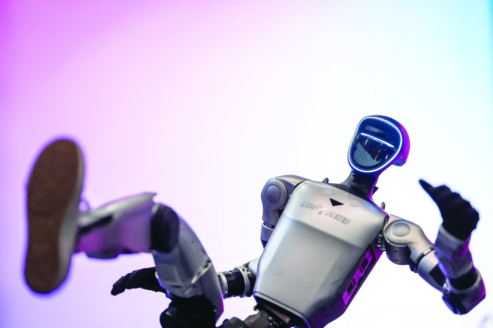 The Unitree robot is pictured at the Artificial Superintelligence Alliance stand during the Web Summit at Parque das Nacoes in Lisbon. — AFP