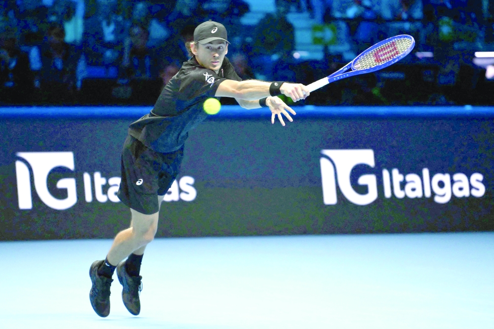 Australia's Alex De Minaur plays a backhand return against Italy's Jannik Sinner at the ATP Finals tennis tournament in Turin. — AFP 