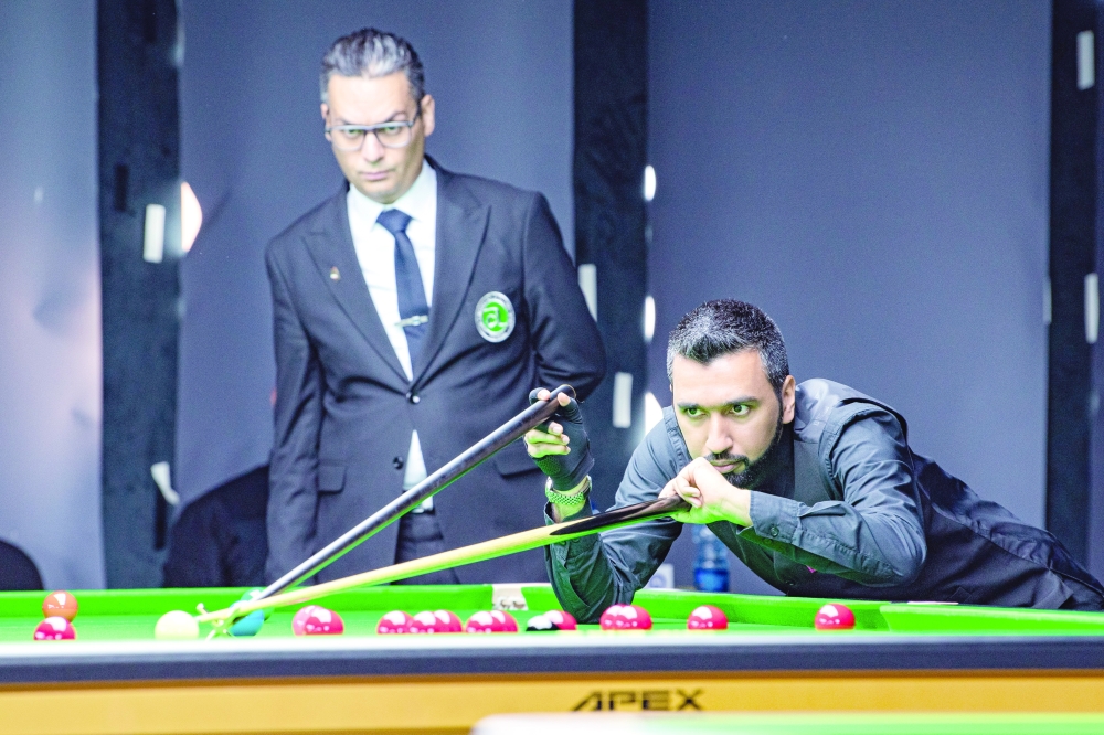 Ali al Obaidli Qatar's player during the match against Afghanistan’s Mohammad Noor Zai.