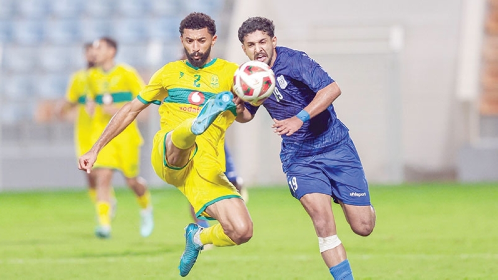 Seeb and Al Nasr players in action.